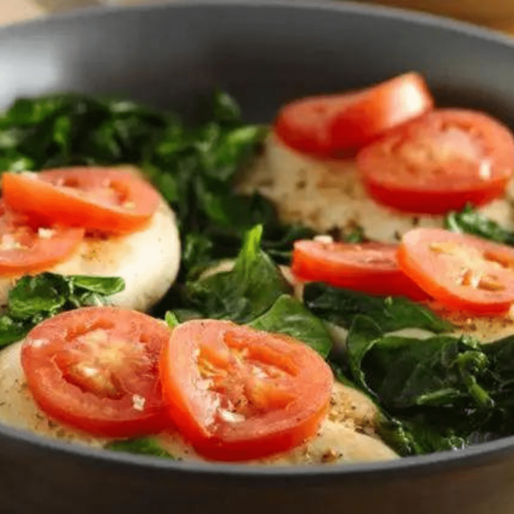 Try our delicious recipe for Herb Chicken with Spinach and Tomatoes. A flavorful and healthy dish that's easy to make!