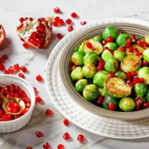 Eating healthy doesn't mean you have to sacrifice the foods you love. Follow us for the Heart Healthy Recipe for Shaved Brussels Sprouts and Pomegranate Salad