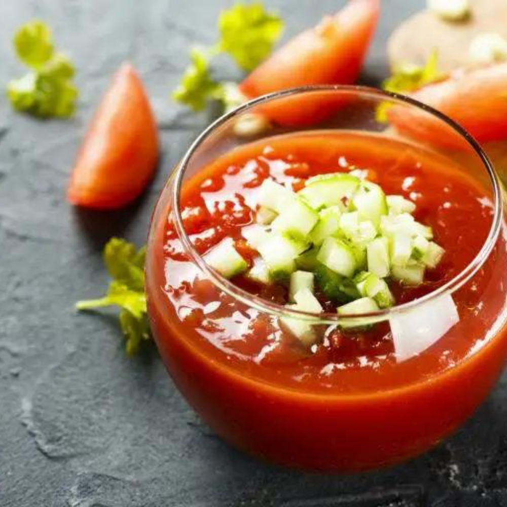 Discover the refreshing flavors of gazpacho, a traditional Spanish soup made with fresh vegetables. Perfect for summertime!