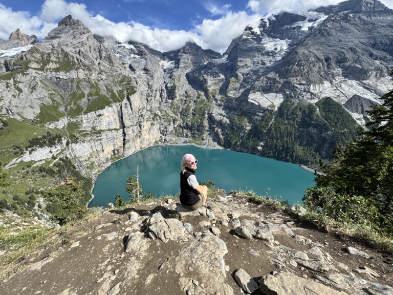 Amy by alpine lake in Switzerland